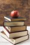apple top pile books front view 23 2148224282